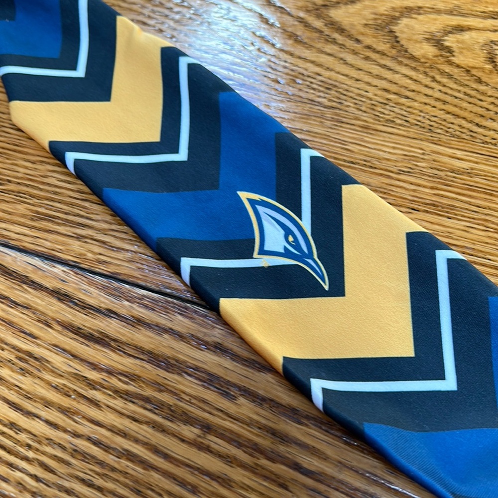 Predators Nashville blue/gold headband.  Approximately 31”